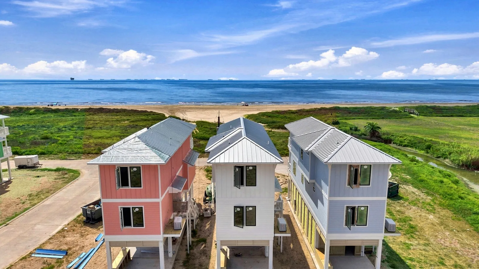 Aerial view of Beach Bungalows under construction with the Gulf of Mexico beyond, Crystal Beach, Texas Aerial view of Beach Bungalows under construction with the Gulf of Mexico beyond, Crystal Beach, Texas