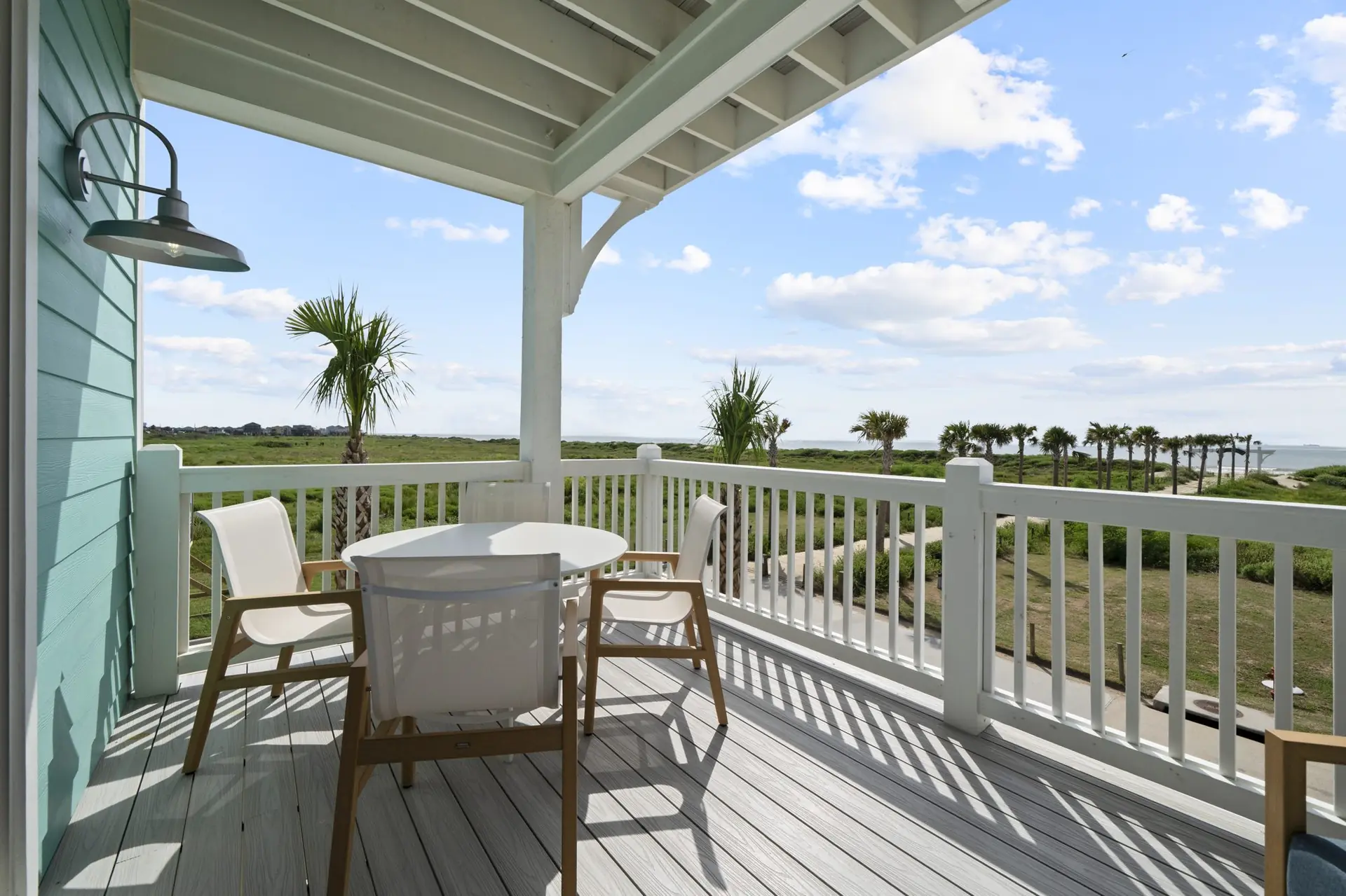 Coffee on the deck, steps from the sand